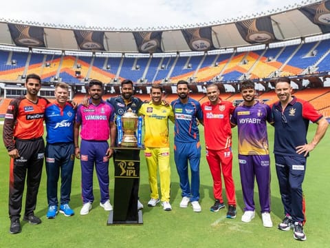 Captains and senior players of the  nine Indian Premier League teams with the trophy ahead of the season 16 opener at Narendra Modi Stadium.