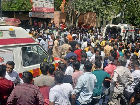 Devotees injured during the stepwell collapse at a Beleshwar Jhulelal Mahadev temple being taken to the hospital, at Patel Nagar area, in Indore on Thursday, Mar 30, 2023. 