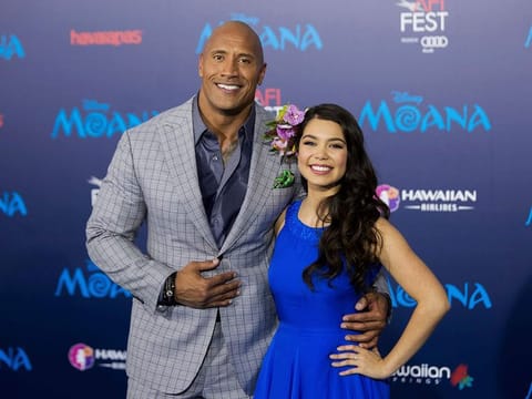 Actors Dwayne Johnson, left, and Auli'i Cravalho appear at the 2016 AFI Fest - "Moana" world premiere in Los Angeles on Nov. 14, 2016. 