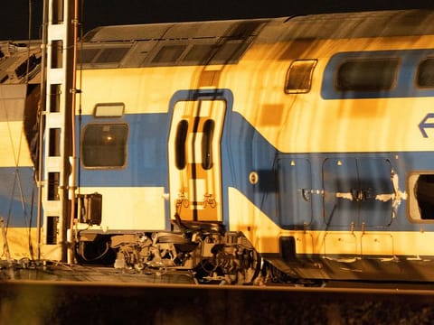 A general view shows aftermath following the derailment of a passenger train after it hit construction equipment on the track, in Voorschoten, Netherlands April 4, 2023 in this picture obtained from social media. 