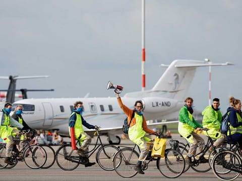Climate activists protest against environmental pollution from aviation at Amsterdam's Schiphol Airport, in Schiphol, Netherlands November 5, 2022. 