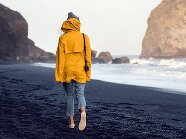 Woman walking on the beach