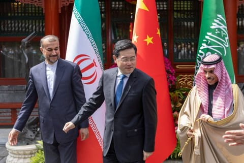 Iranian Foreign Minister Hossein Amir-Abdollahian, Saudi Arabia's Foreign Minister Prince Faisal bin Farhan Al Saud and Chinese Foreign Minister Qin Gang during their meeting in Beijing, China, April 6, 2023. 
