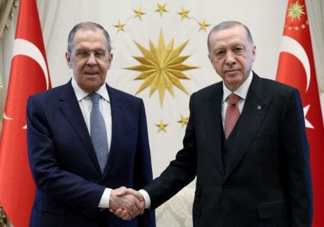 Turkish President Recep Tayyip Erdogan shaking hands with Russian Foreign Minister Sergey Lavrov at Presidential Complex, in Ankara on April7.