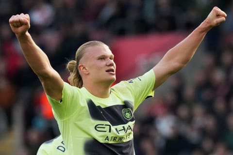 Manchester City's Erling Haaland celebrates after scoring his side's third goal during the English Premier League match against Southampton at St Mary's Stadium in Southampton, England.
