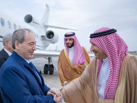 Saudi Arabia’s Deputy Foreign Minister Waleed Al Khuraiji receives Syrian Foreign Minister Faisal Mekdad at King Abdulaziz International Airport in Jeddah on Wednesday.. 