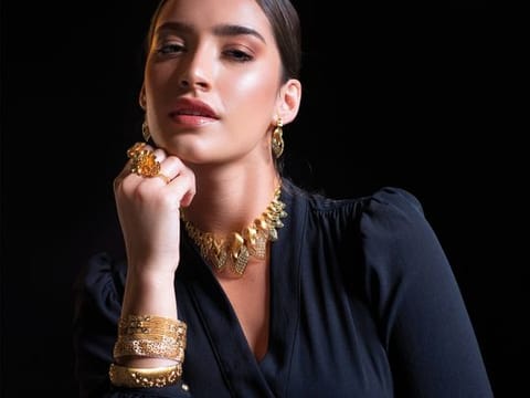 Front open blouse Dh99, LC Waikiki.  JEWELLERY: Turkish-finish 22K gold necklace, earrings, bangles and rings, POR, all by Sky Jewellery