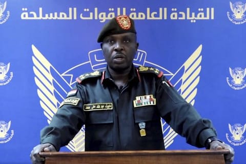 In this frame grab from a video posted by Sudan's state news agency, SUNA on April 13, spokesman for the Sudanese Armed Forces Brig. Nabil Abdullah reads a statement warning of conflict after the recent deployment of Sudan's powerful paramilitary in the capital and other cities.  