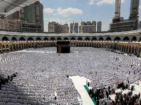 Worshippers pray around the Kaaba, Islam's holiest shrine, at the Grand Mosque in the holy city of Mecca on April 14, 2023. 