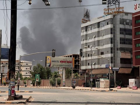 Smoke is seen rising from a neighbourhood in Khartoum, Sudan, Saturday, April 15, 2023. 