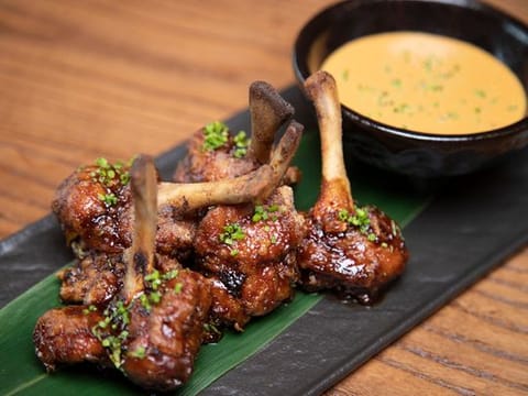 Chicken lollies with Japanese glaze and Korean Gochujang chili 
