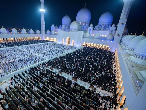Worshippers pray at the Sheikh Zayed Grand Mosque in Abu Dhabi late on April 17, 2023 during Laylat Al Qadr, one of the holiest nights during the Muslim holy fasting month of Ramadan. -