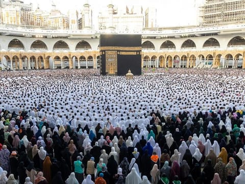 The faithful perform their Eid Al Fitr prayers at the Grand Mosque, in Mecca, Saudi Arabia, on April 21, 2023.  
