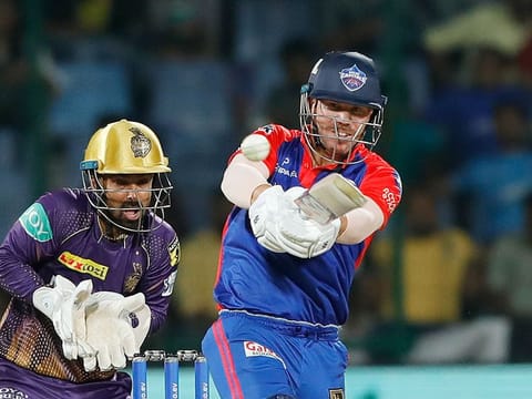 Captain David Warner of the Delhi Capitals hits a four in the Tata Indian Premier League match against the Kolkata Knight Riders at the Arun Jaitley Stadium, Delhi, on April 20, 2023. Warner scored more freely and more quickly as he struck 57 to set up Delhi’s chase. 