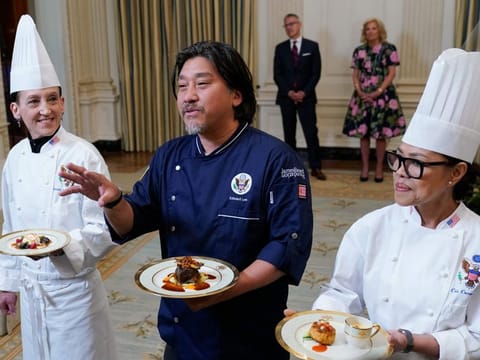 Guest Chef Edward Lee, centre, flanked by White House Executive Pastry Chef Susie Morrison, left, and White House Executive Chef Cris Comerford, right, talks about the menu during a preview, Monday, April 24, 2023, for Wednesday's State Dinner with South Korea's President Yoon Suk Yeol at the White House in Washington.
