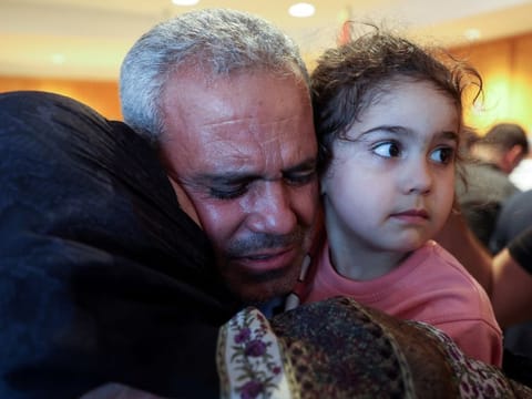 Ali Mazloum, a Lebanese citizen who was evacuated from Sudan, is welcomed upon arrival at Beirut airport on April 25, 2023. 