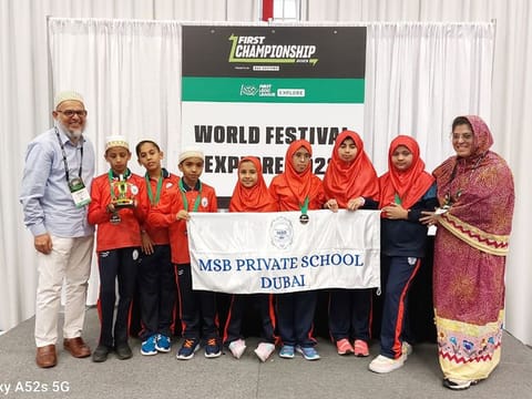 The Creative Engineers team, comprised of seven students from grades 4 to 6, after their win in Houston 