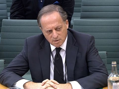 In this file video grab taken from footage broadcast by the UK Parliament's Parliamentary Recording Unit (PRU) on February 7, 2023 shows BBC chairperson Richard Sharp testifying in front of a Digital, Culture, Media and Sport (DCMS) Committee in London - Sharp announced his resignation on April 28, 2023 over involvement in securing a private credit line for up to £800,000 ($990,000) for the then-PM Boris Johnson from a Canadian businessman.