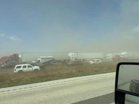 A view of vehicles in a dust storm, which cut visibility to near zero and triggered a series of chain-reaction crashes involving dozens of vehicles, on a highway in Springfield, Illinois, U.S. May 1, 2023 in this picture obtained from social media.