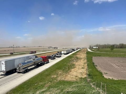 A crash involving at least 20 vehicles shut down a highway in Illinois, Monday, May 1, 2023. 