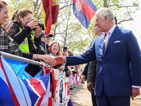 Britain's King Charles meets well-wishers during a walkabout on the Mall outside Buckingham Palace ahead of his and Camilla, Queen Consort's coronation, in London, on May 5, 2023.  
