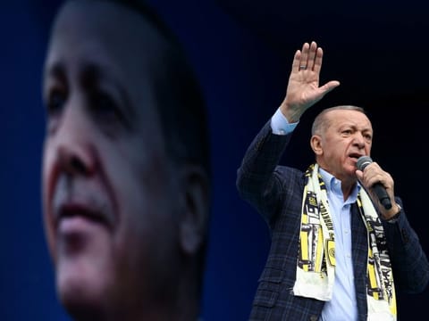 Turkish President Tayyip Erdogan addresses his supporters during a rally ahead of the May 14 presidential and parliamentary elections, in Ankara, on  April 30, 2023.  