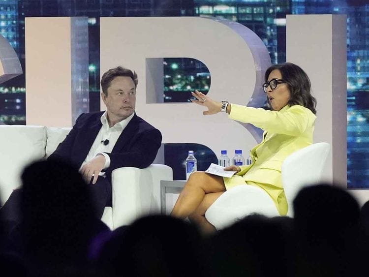 Elon Musk with Linda Yaccarino