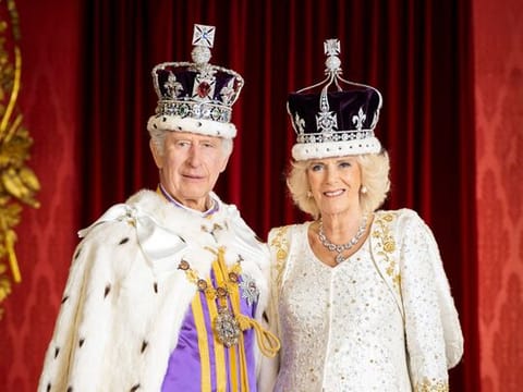 A handout photo taken and released by Buckingham Palace on May 8, 2023 shows Britain's King Charles III and Britain's Queen Camilla posing in the Throne Room at Buckingham Palace, in London. The portrait has been released to mark their Coronation on May 6, 2023.