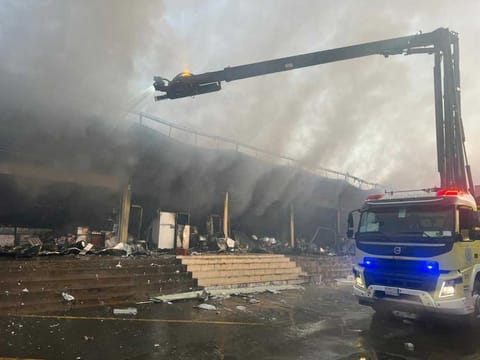 Photos posted by Makkah authorities Sunday showing efforts to extinguish a fire at Al Sawarikh market. 
