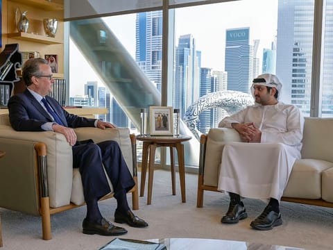 Sheikh Maktoum bin Mohammed bin Rashid Al Maktoum with S&P's Douglas L. Peterson at DIFC.
