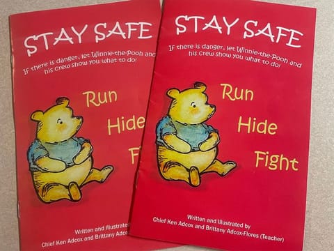 The “Stay Safe” book distributed to students in the Dallas Independent School District features Winnie-the-Pooh characters instructing students to run, hide and fight in a school shooting.