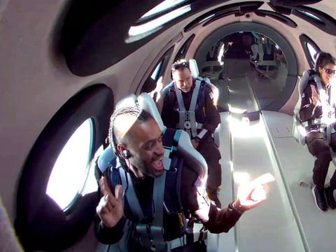 Mission specialist Christopher Huie, left, instructor Luke Mays, center, and mission specialist Jamila Gilbert during a Virgin Galactic spaceflight test on Thursday, May 25, 2023. 