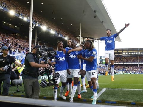 Happy ever after! Everton's Abdoulaye Doucoure celebrates scoring with Conor Coady, Demarai Gray and Alex Iwobi.