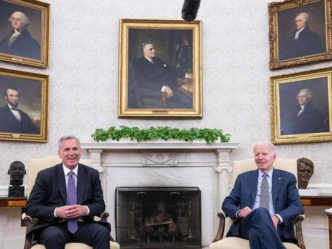 US President Joe Biden (right) meets with US House Speaker Kevin McCarthy about the debt ceiling, in the Oval Office of the White House in Washington, DC, on May 22, 2023. US President Joe Biden and Republican legislators have reached an agreement in principle to raise the US debt ceiling and thereby avoid catastrophic default, US media reported.
