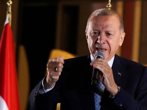 Turkish President Tayyip Erdogan addresses his supporters following his victory in the second round of the presidential election at the Presidential Palace in Ankara, Turkey  