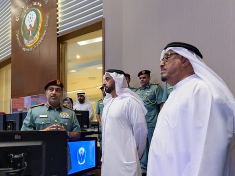 (centre) Lieutenant General Sheikh Saif bin Zayed Al Nahyan, Deputy Prime Minister and Minister of the Interior being briefed about the features of the Room. To his left is Lieutenant General Dhahi Khalfan Tamim, Deputy Chief of Police and Public Security in Dubai.