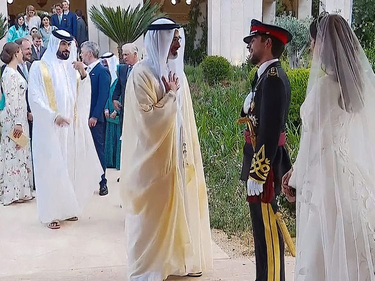 Sheikh Khaled with Prince Hussain bin Abdullah II and Princess Rajwa in Amman on June 1.