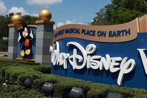 The expense is part of a previously announced plan to write down some programming, the company said in a filing Friday.