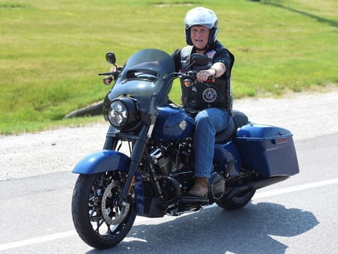 US Republican presidential candidate and former US Vice-President Mike Pence rides a motorcycle during the "Roast and Ride" event hosted by U.S. Senator Joni Ernst in Des Moines, Iowa, U.S. June 3, 2023.