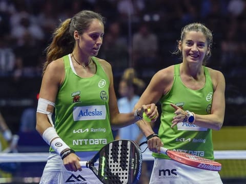 Gemma Triay and Alejandra Salzar of Jaguars celebrating a point against against Lucia Sainz and Bea Gonzalez of Panthers on Saturday.