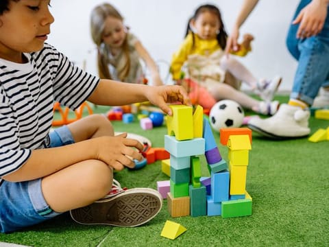 Children playing indoors.