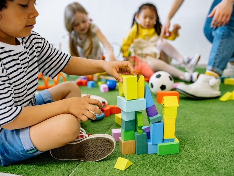 Children playing indoors.