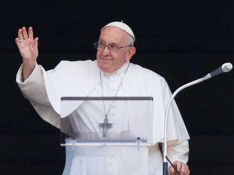 Pope Francis leads the Angelus prayer from his window at the Vatican, June 18, 2023. 