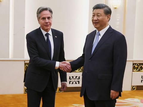 U.S. Secretary of State Antony Blinken shakes hands with Chinese President Xi Jinping in the Great Hall of the People in Beijing, China.