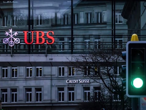 UBS erased earlier gains to trade down 1.4% at 18.25 Swiss francs ($20.343) as of 11:12 am in Zurich. The shares have gained 7.5% this year.