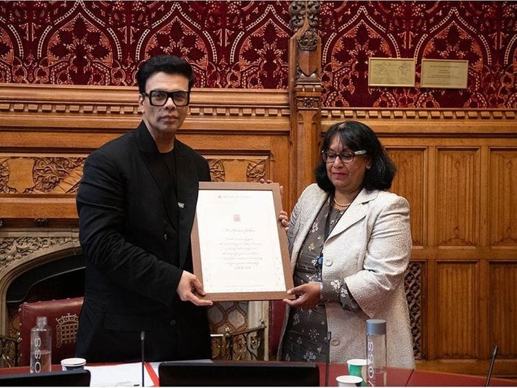 Karan Johar and Baroness Sandy Verma 