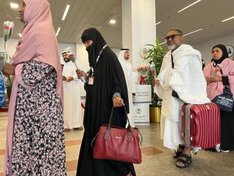 Pilgrims from Bangladesh and Pakistan arrive at King Abdul Aziz airport in Jeddah, ahead of the Hajj pilgrimage in Mecca, on June 20, 2023.  