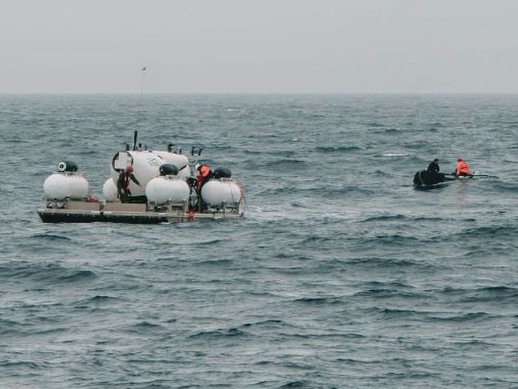 In this image released by Action Aviation, the submersible Titan is prepared for a dive into a remote area of the Atlantic Ocean on an expedition to the Titanic on Sunday, June 18, 2023. 