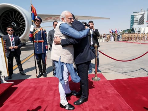 Prime Minister Narendra Modi being received by Egyptian PM Mostafa Madbouly on his arrival in Cairo on Saturday.  