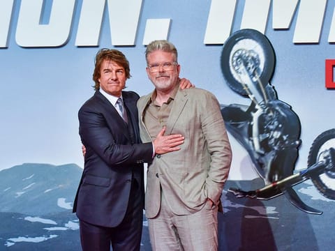 US actor Tom Cruise and director Christopher McQuarrie during the premiere of their film 'Mission: Impossible  Dead Reckoning Part One' in Abu Dhabi on June 26, 2023.